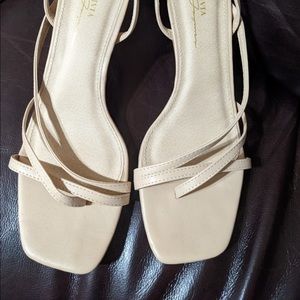 Lulu’s nude kitten heels.
